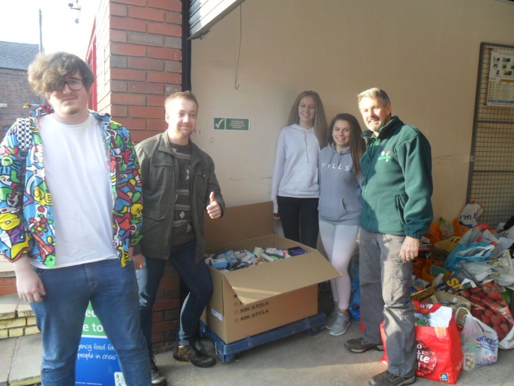 Students on childcare course deliver parcels to local food bank